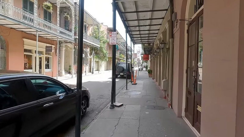 Quiet morning on Chartres Street showcasing classic architecture in New Orleans