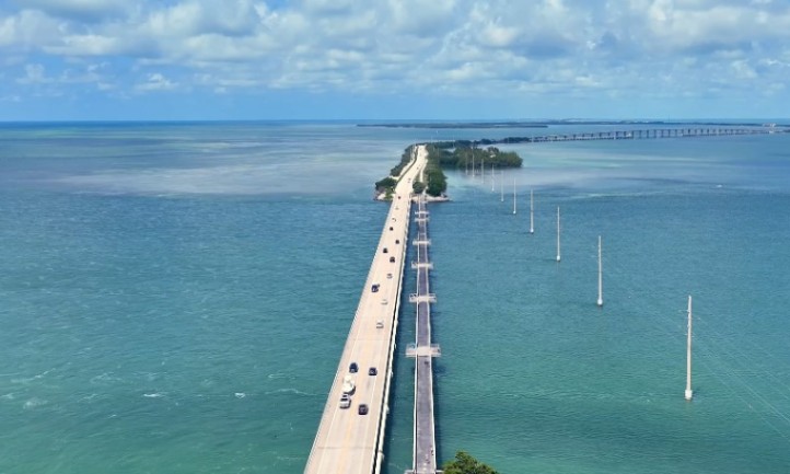 The Overseas Highway stretches over water with scenic views of the ocean